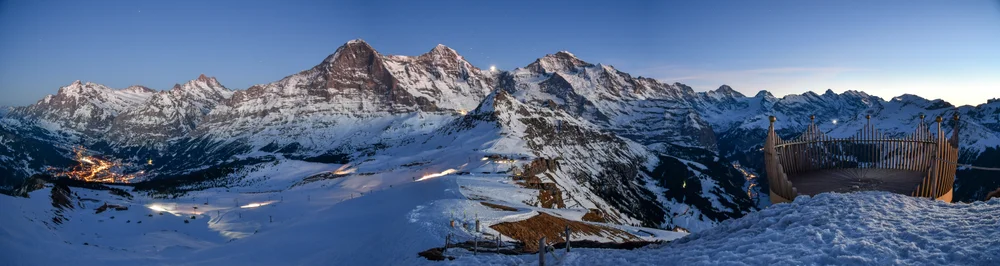 Snow-covered Bernese Alps seen from the Royal Walk on the Männlichen