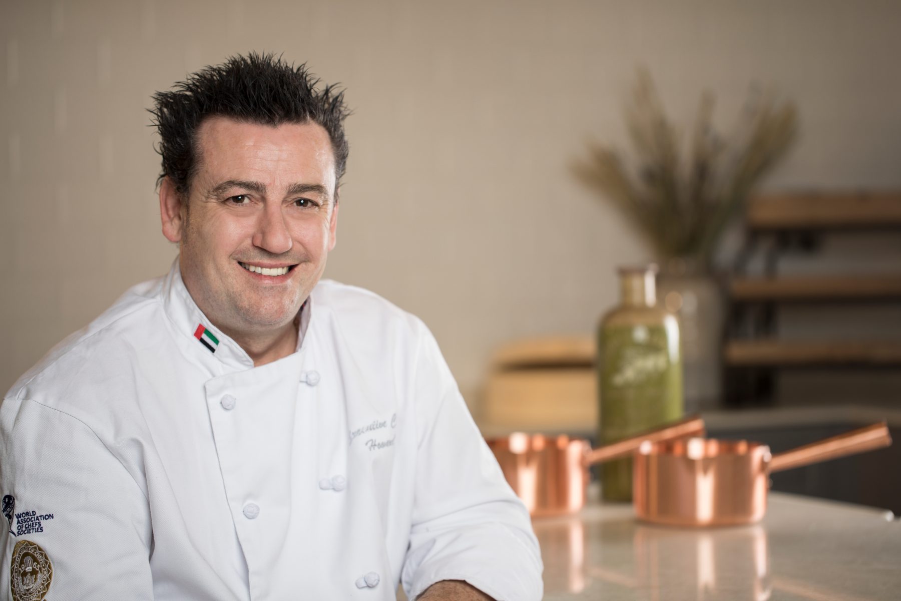 Chef portrait in a bright kitchen