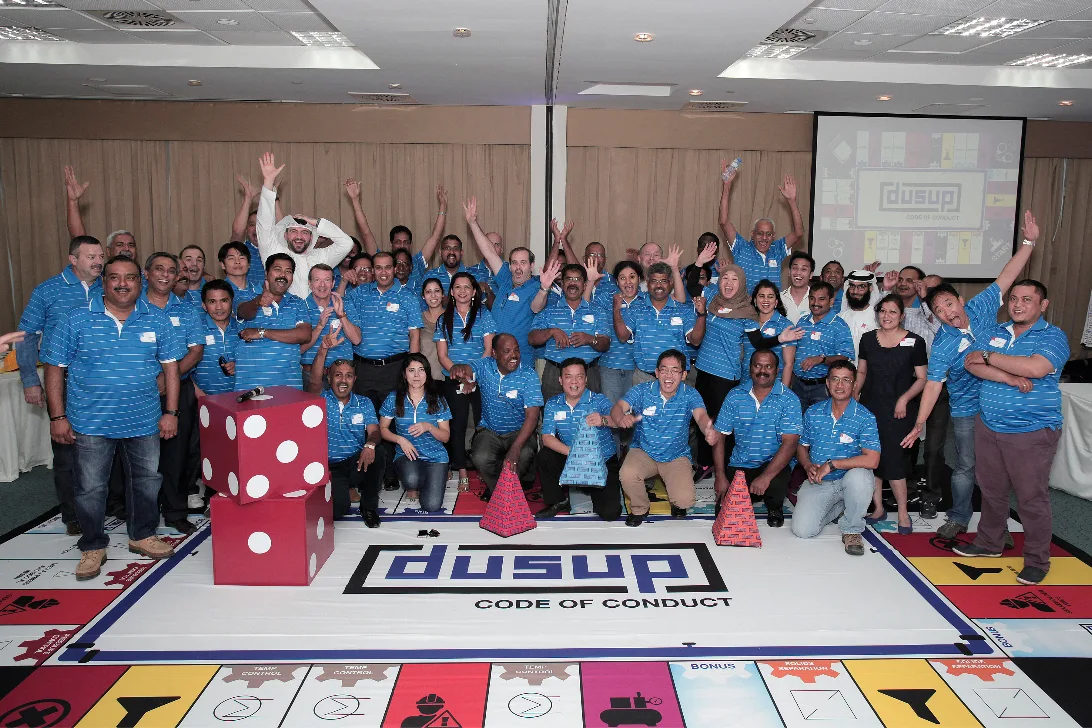 Large team photo at a company away day
