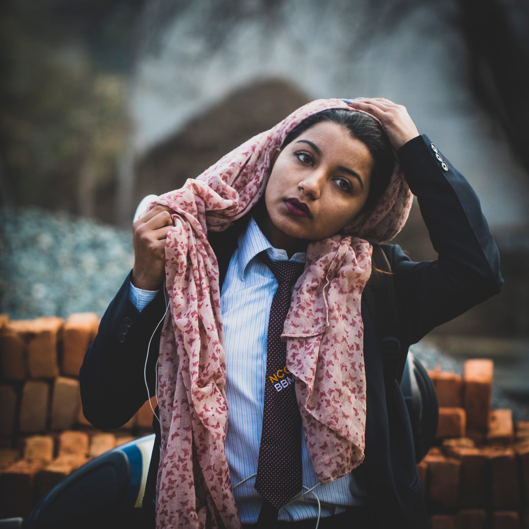 Portrait of a woman in a patterned headscarf