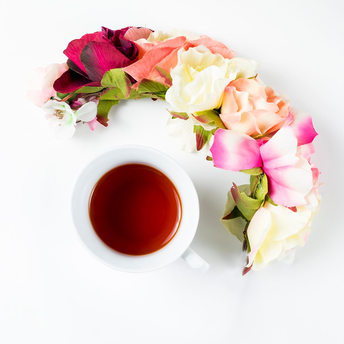 Tea and flowers styled flat lay