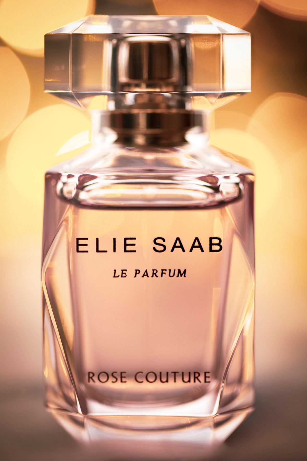 Perfume bottle product shot with warm backlight