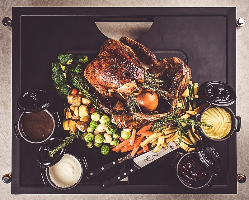 Roast dish styled from above on a dark board