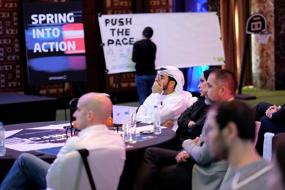 Audience watching a presentation at a corporate event