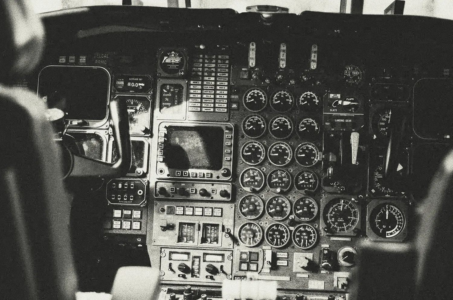 A cockpit with a lot of flying instruments