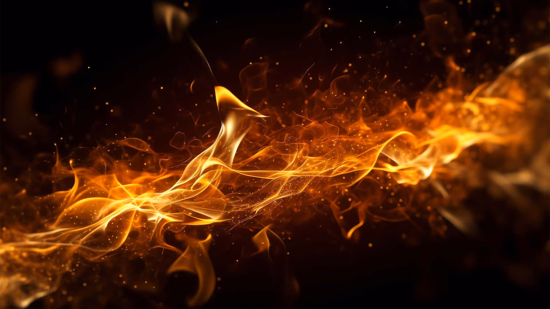 Bright orange flames swirling against a dark background, creating a dynamic and intense scene.