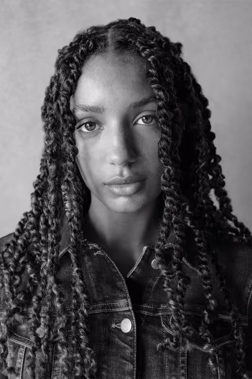 Gas Jeans: black and white portrait of a model with long braids