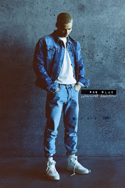 Gas Jeans: man in a denim jacket and jeans with product label