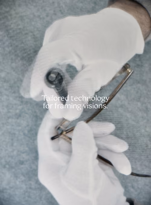 Eye Tech Club: gloved hands holding glasses, Tailored technology for framing visions