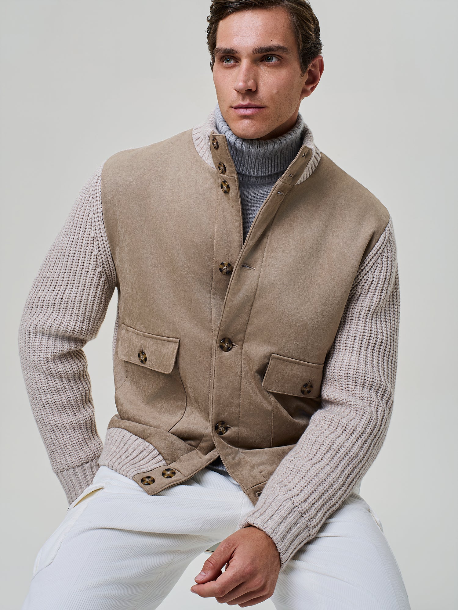 Paul Taylor FW26: model in a suede vest with knit sleeves