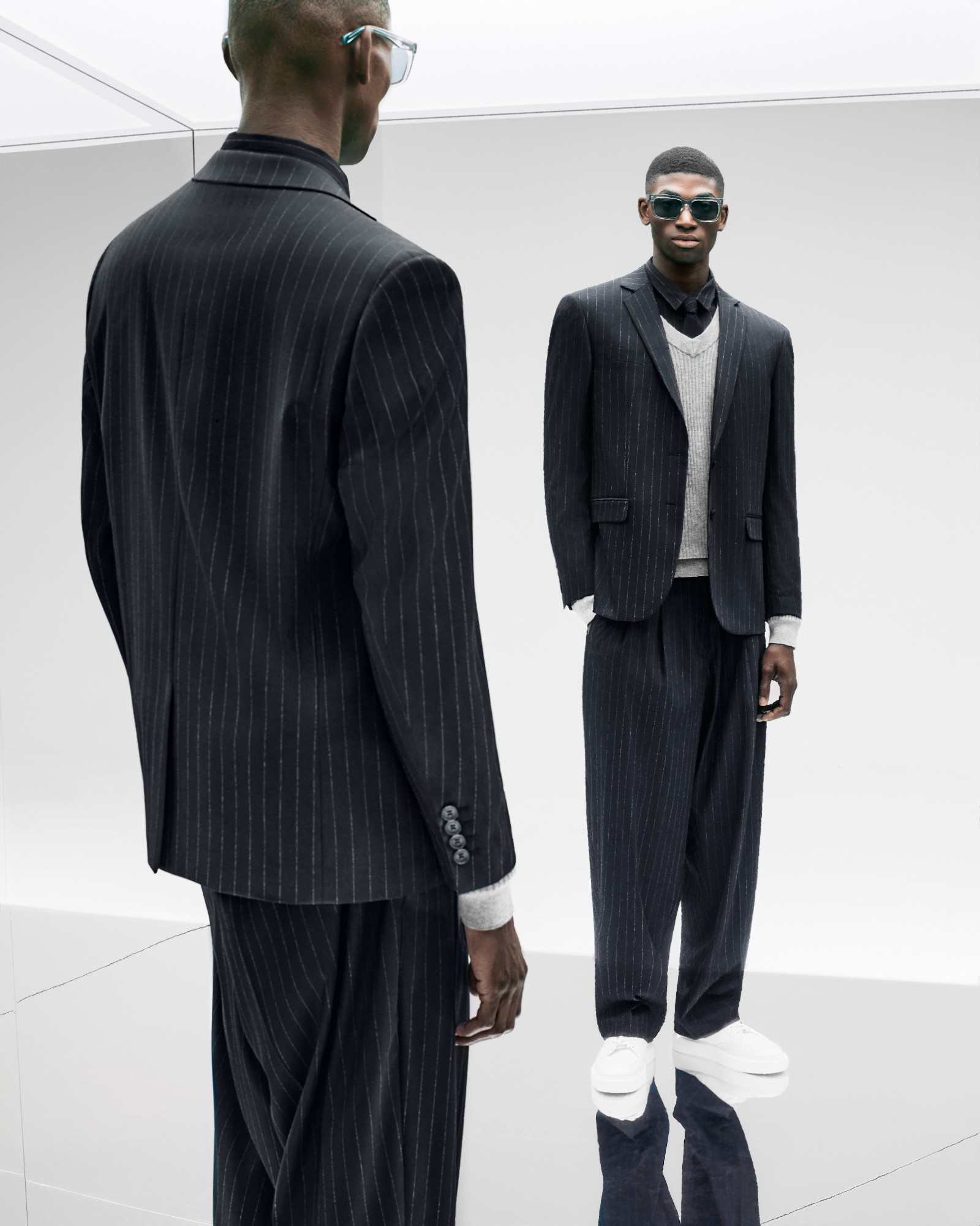 Antony Morato pinstripe suit seen from behind and in the mirror