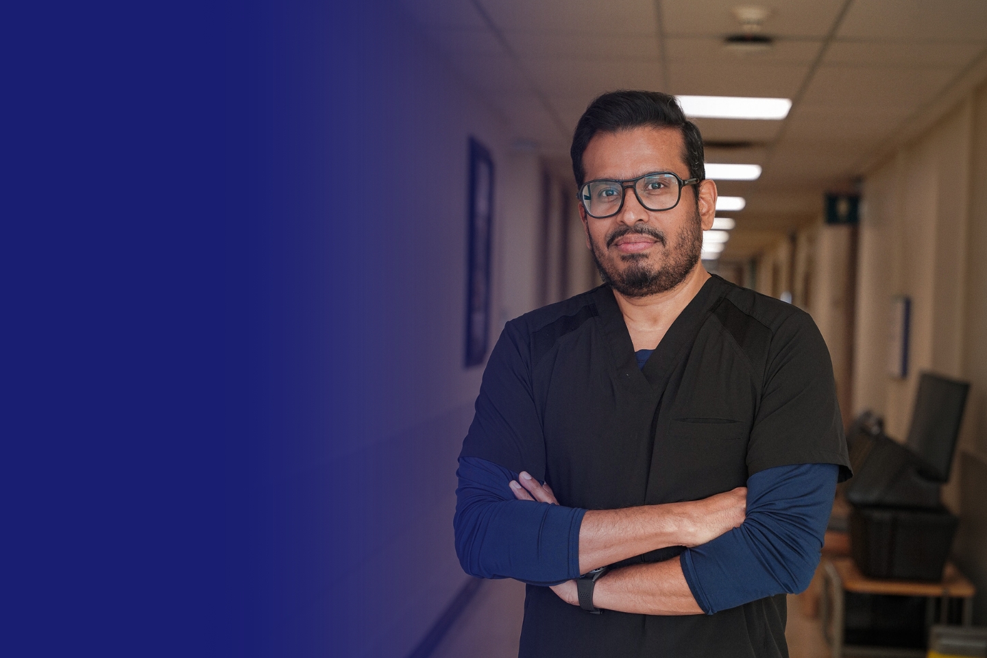 Dr. Christopher Yarnell, a critical care physician at Scarborough Health Network, standing inside a building at the University of Toronto Scarborough.