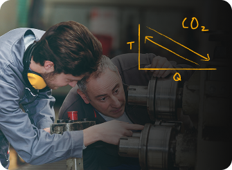 Workers looking at machinery