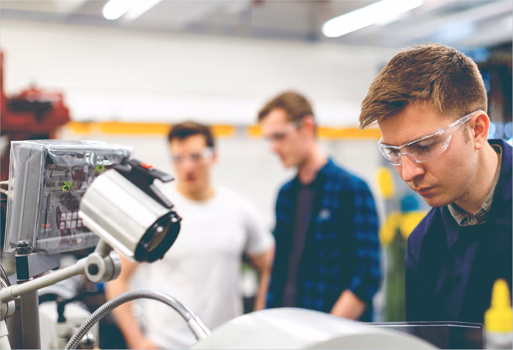 Student looking at equipment