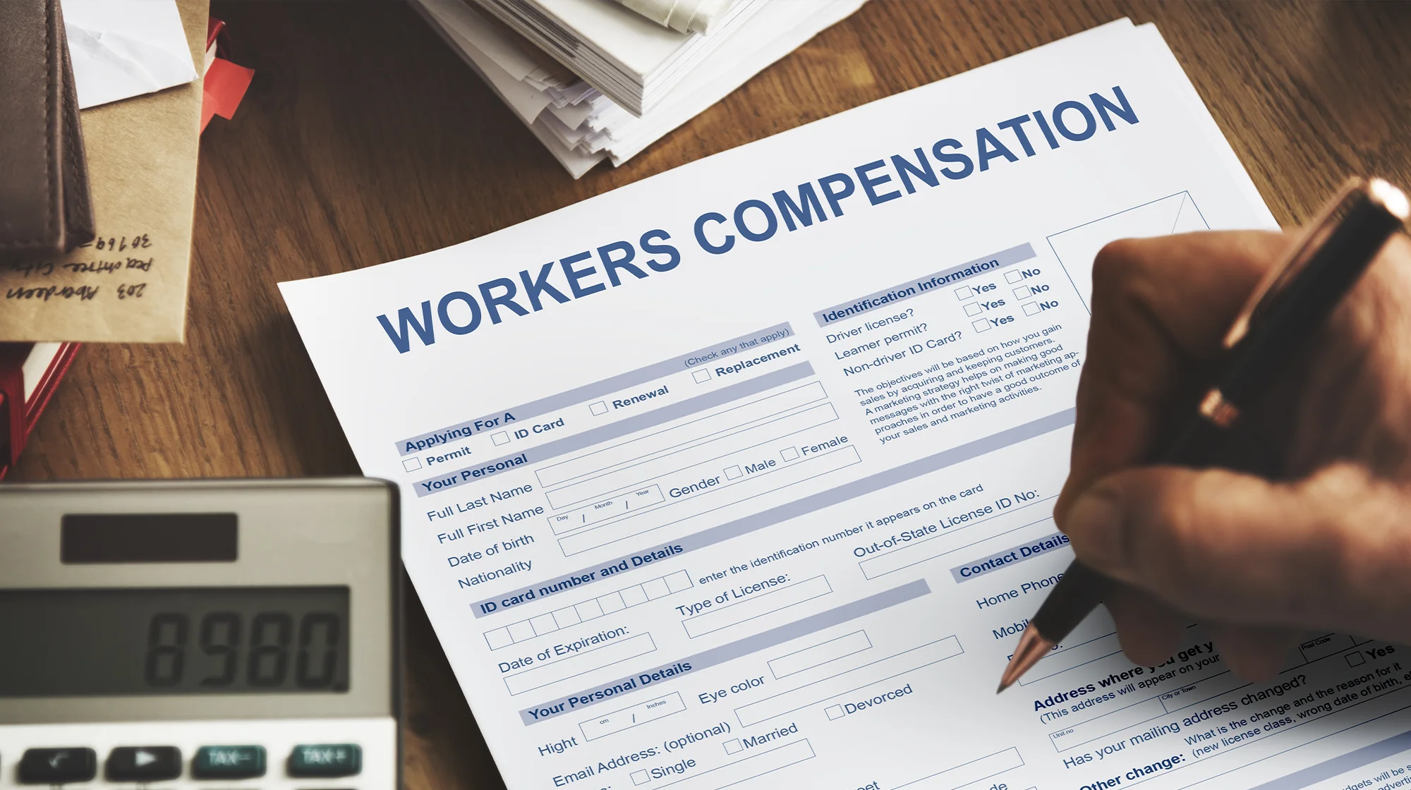 A "Workers Compensation" form on a table.