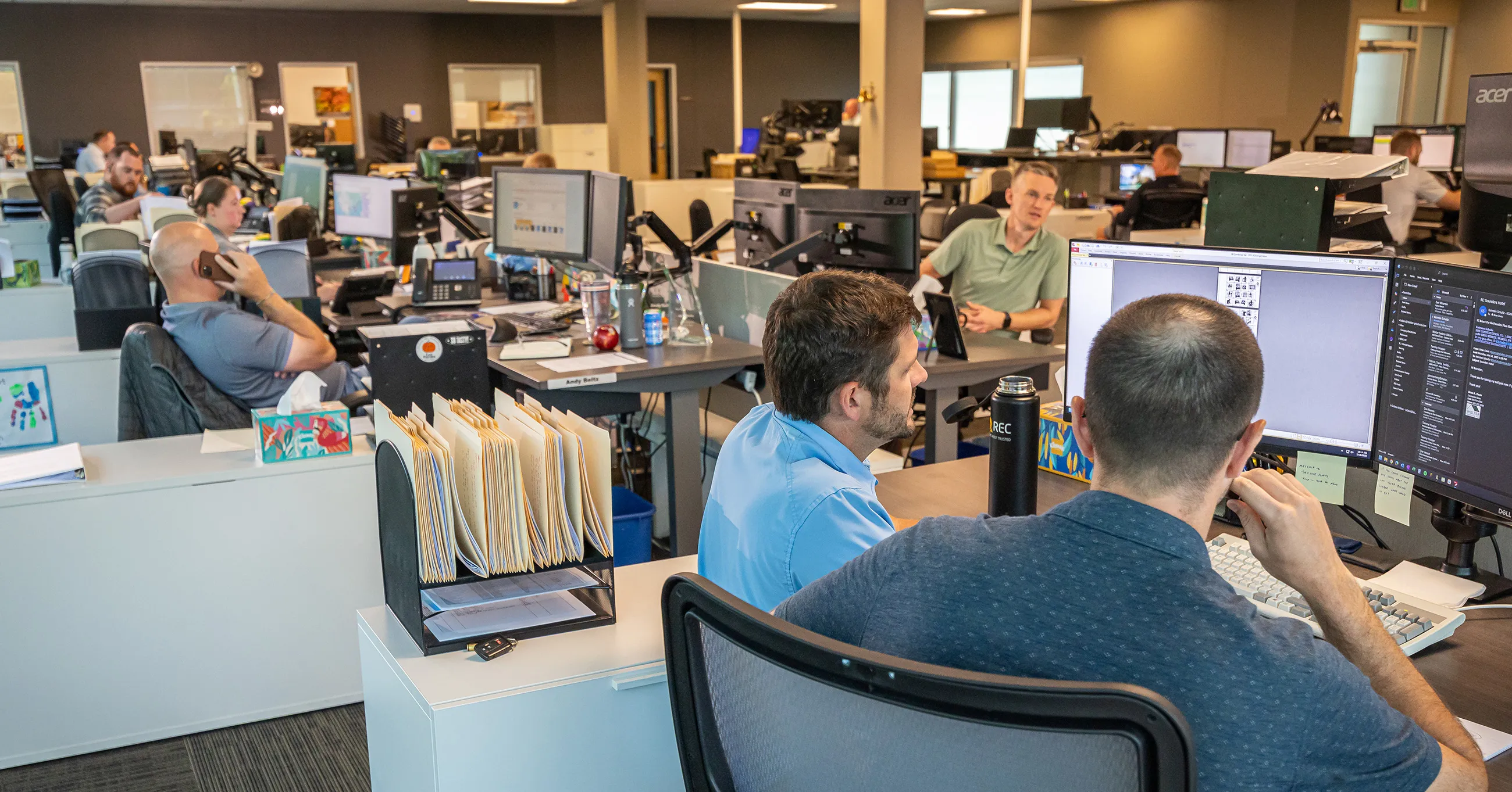 Shelter Products employees working on the trading floor