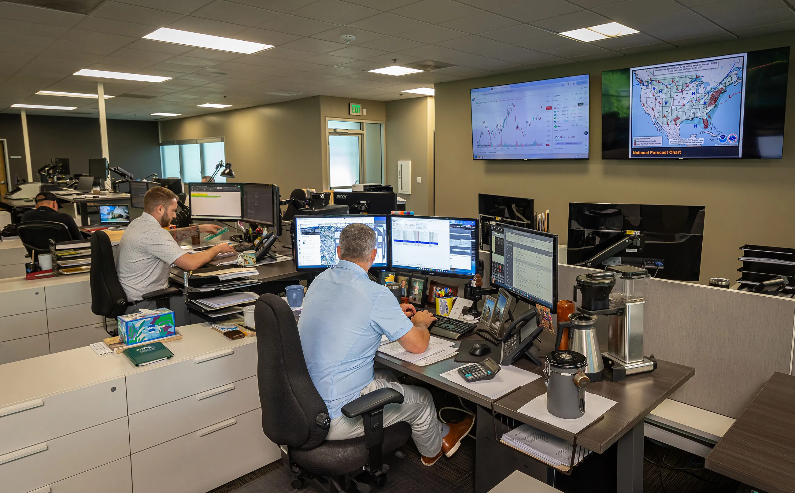 2 Shelter Products, Inc. employees working at their desks