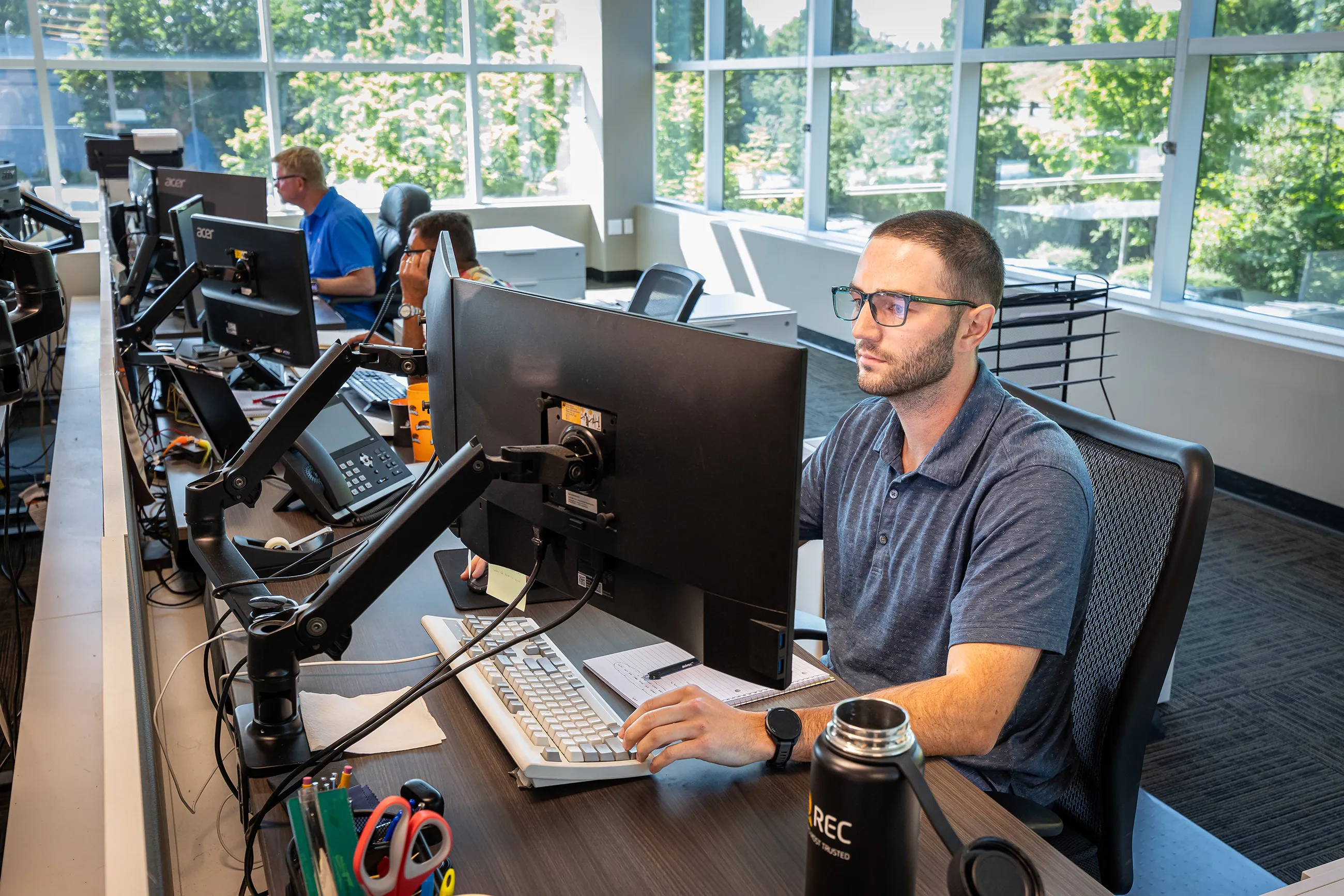 A Shelter Products employee working at his desk
