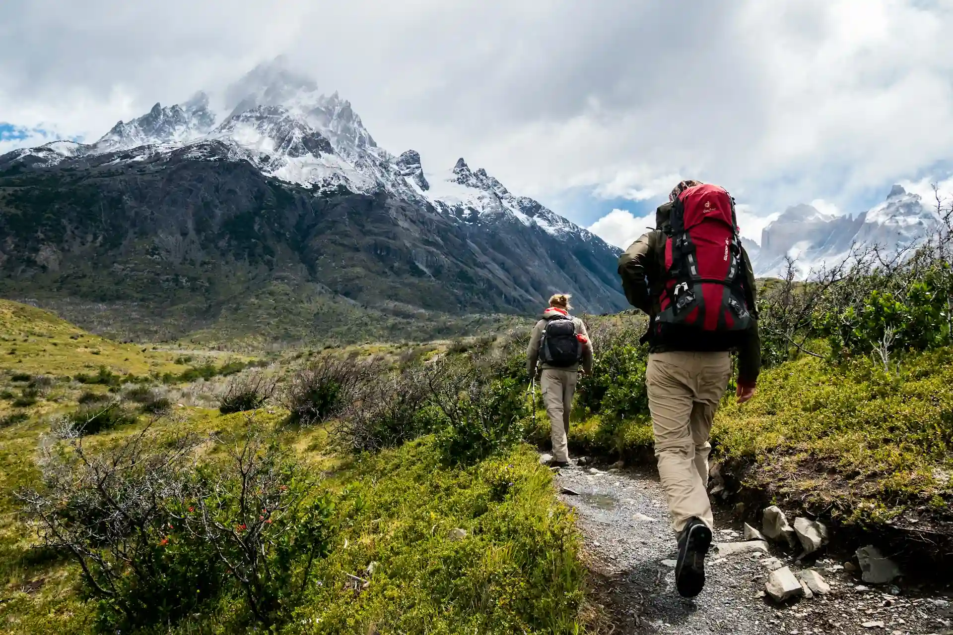 Travelers walk to the mountain