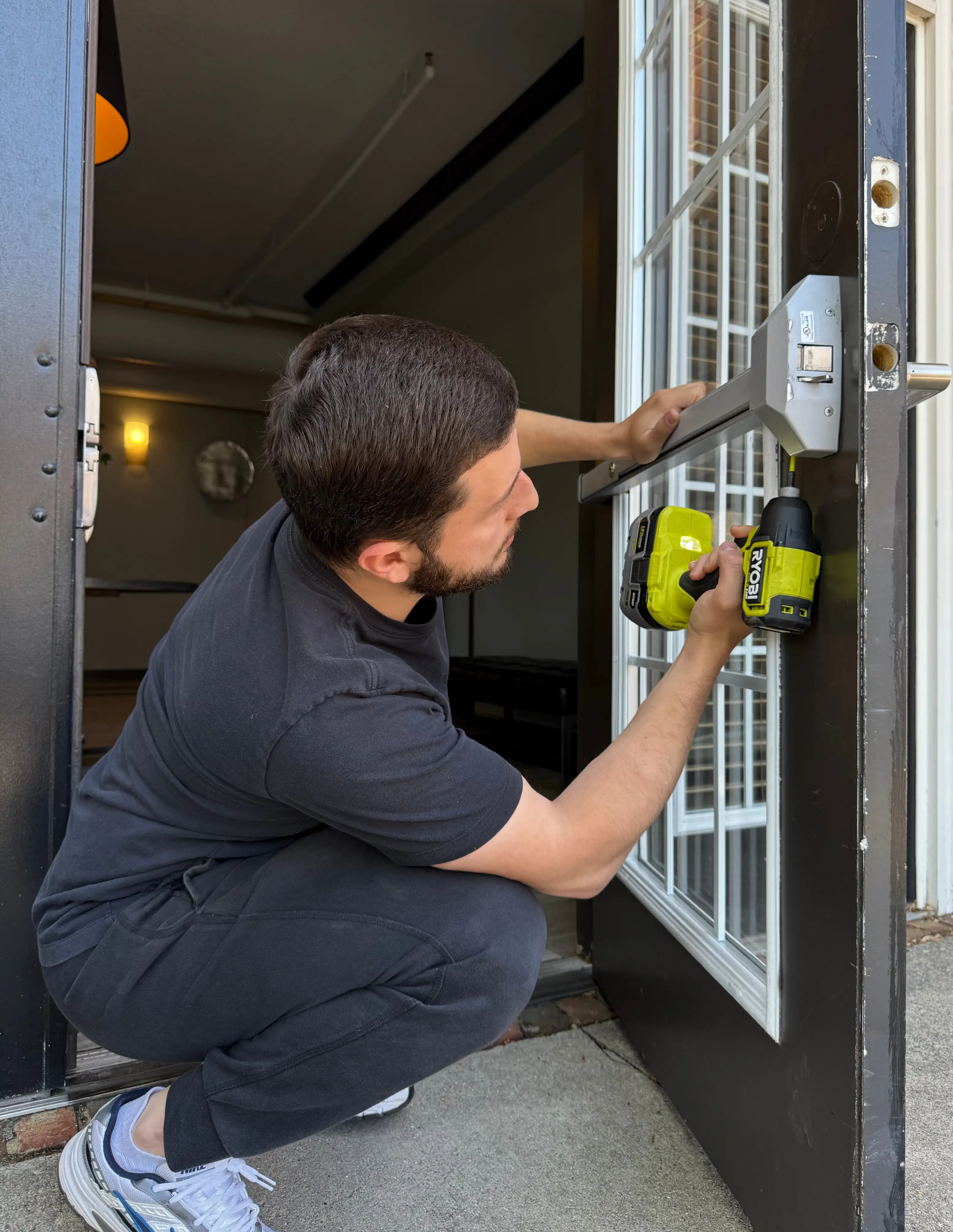 Locksmith technician in a work process
