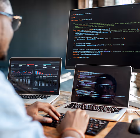 Man coding on computer
