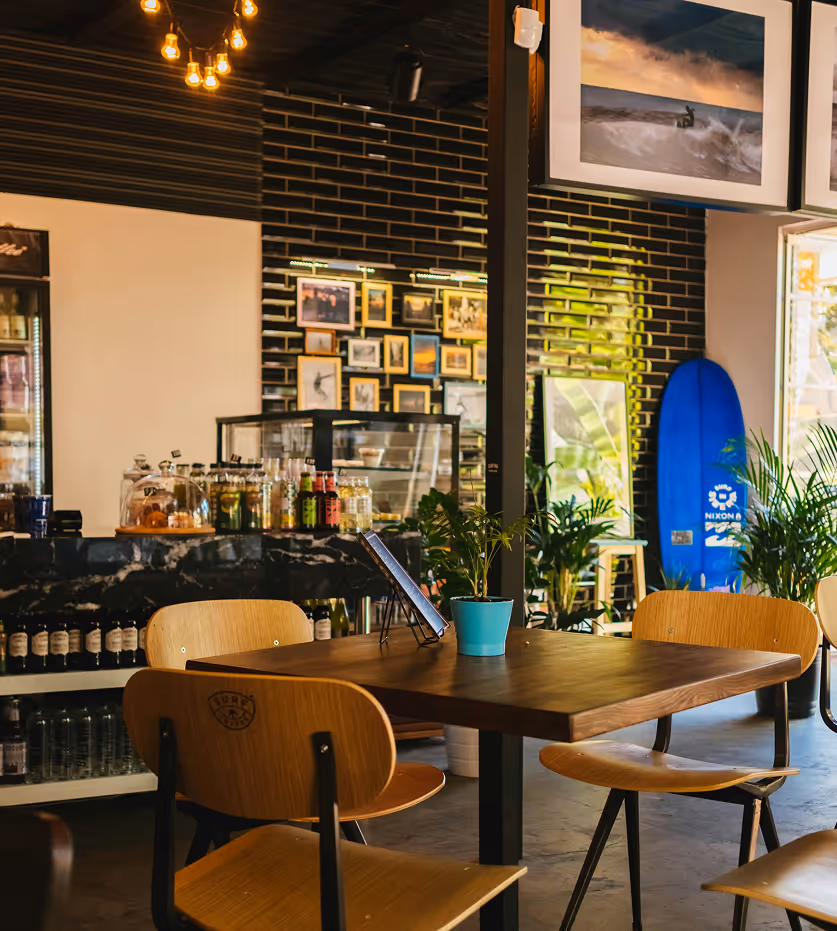 Local restaurant dining area with tables