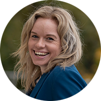 Woman with blonde wavy hair.