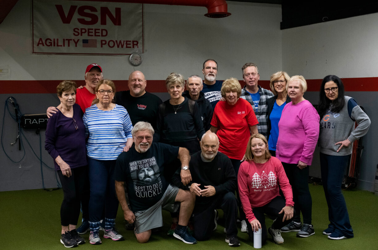 Group of people posing for a photo. 