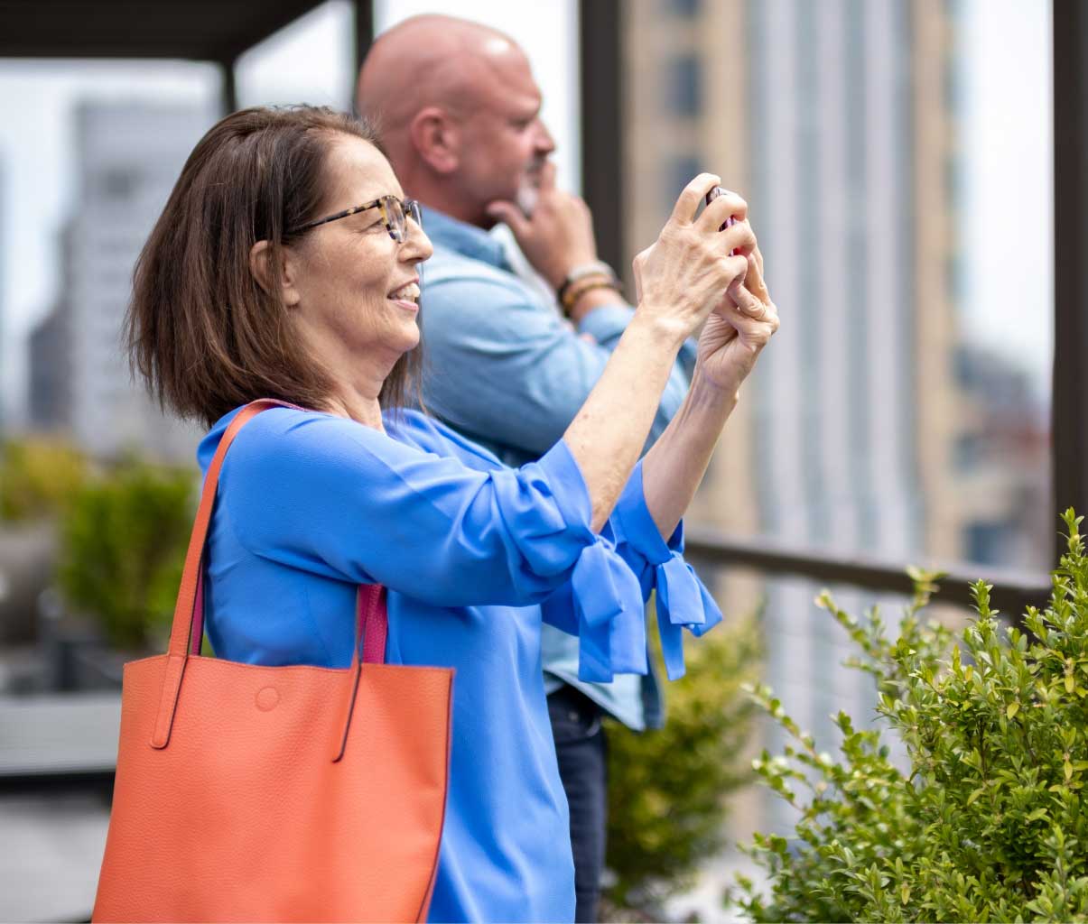 Gail taking a picture in downtown New York City