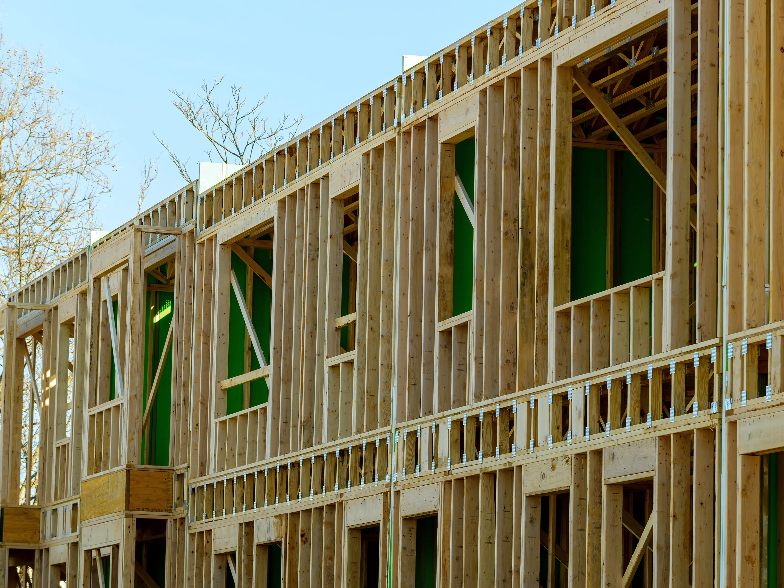 Light structural lumber on a construction project supplied by Shelter Products Inc.