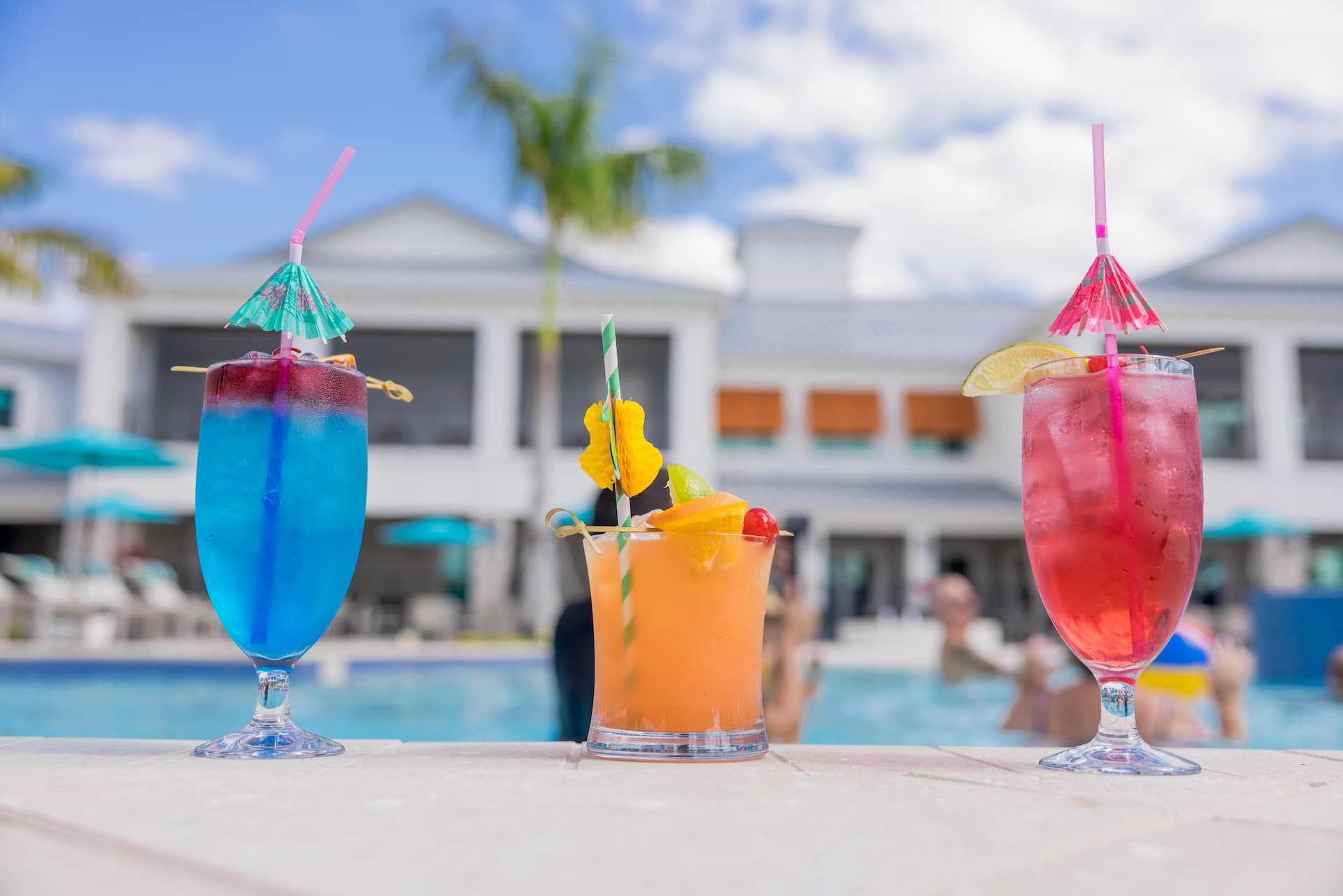 Poolside drinks at Cabana Blu, part of Blu Ocean Grille at Encore at Tradition, highlighting the outdoor dining options available at restaurants in Tradition Port St. Lucie.