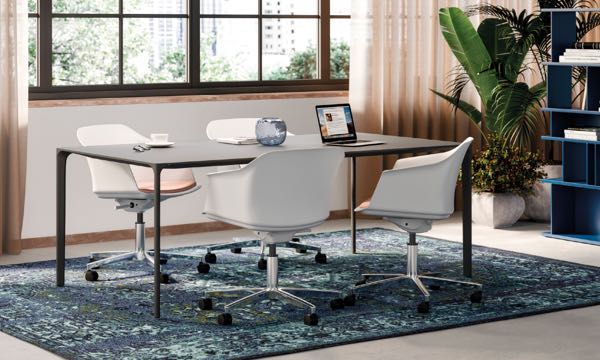 Attune Swivel Chairs White Orange Seats at Table