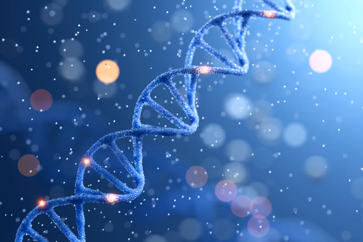 a strand of dna against a blue background with particles floating