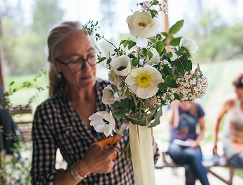 Angie arranging a bouquet