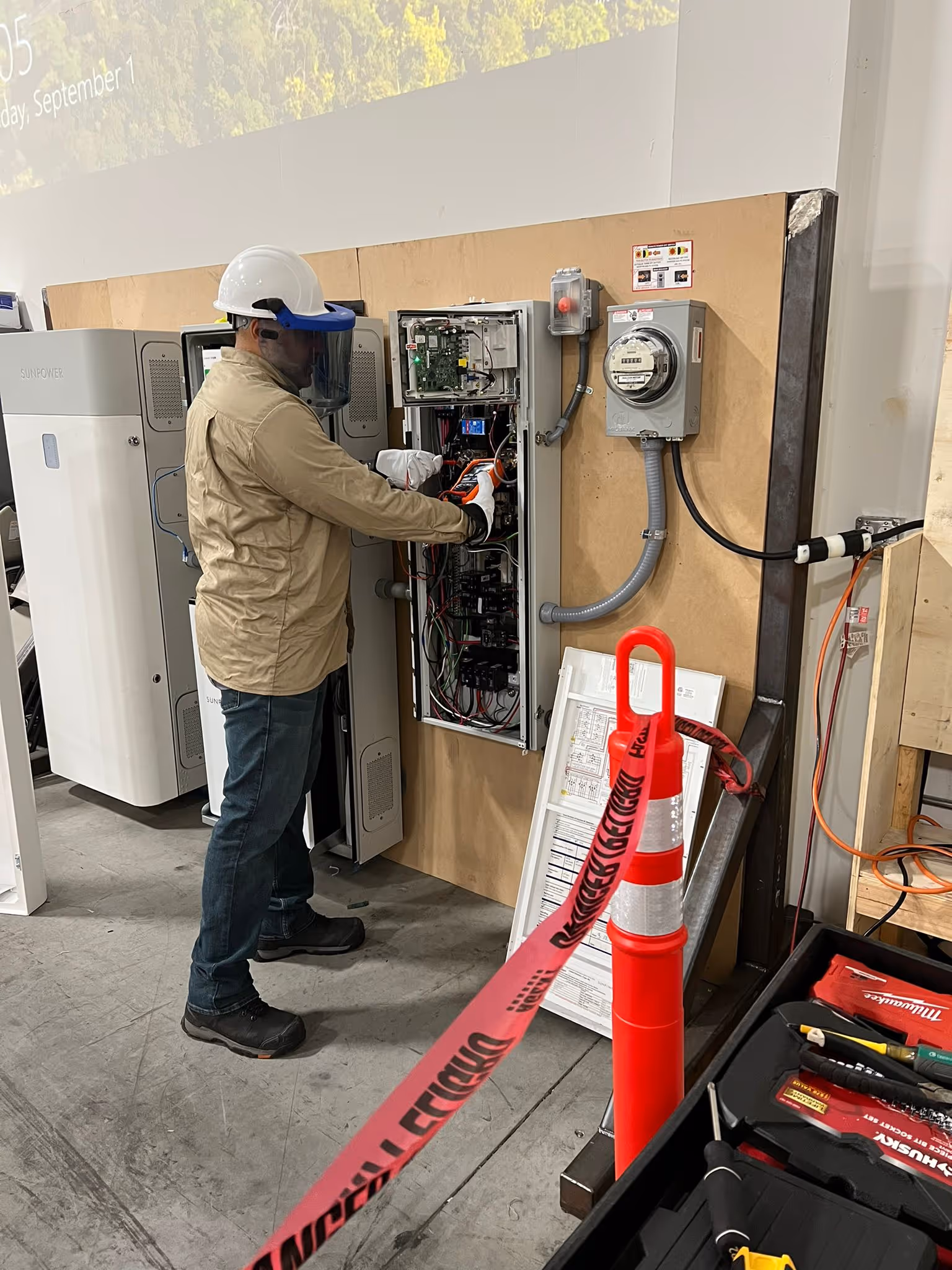 Baker Makarem instructing on Solar Energy Storage System best practices.
