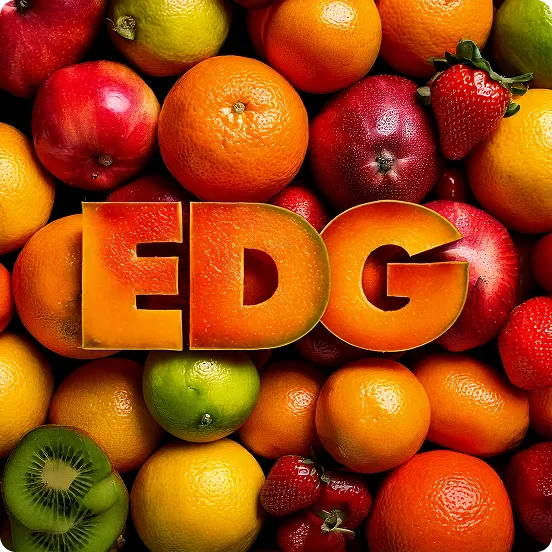 Assorted fresh fruits including oranges, strawberries, kiwi, apples, limes, and lemons with the letters 'EDG' in orange color overlaying the fruits.