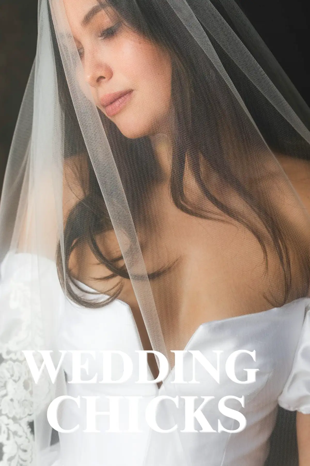Bride with eyes lowered, sheer veil across her face and shoulder, San Canzian, Istria