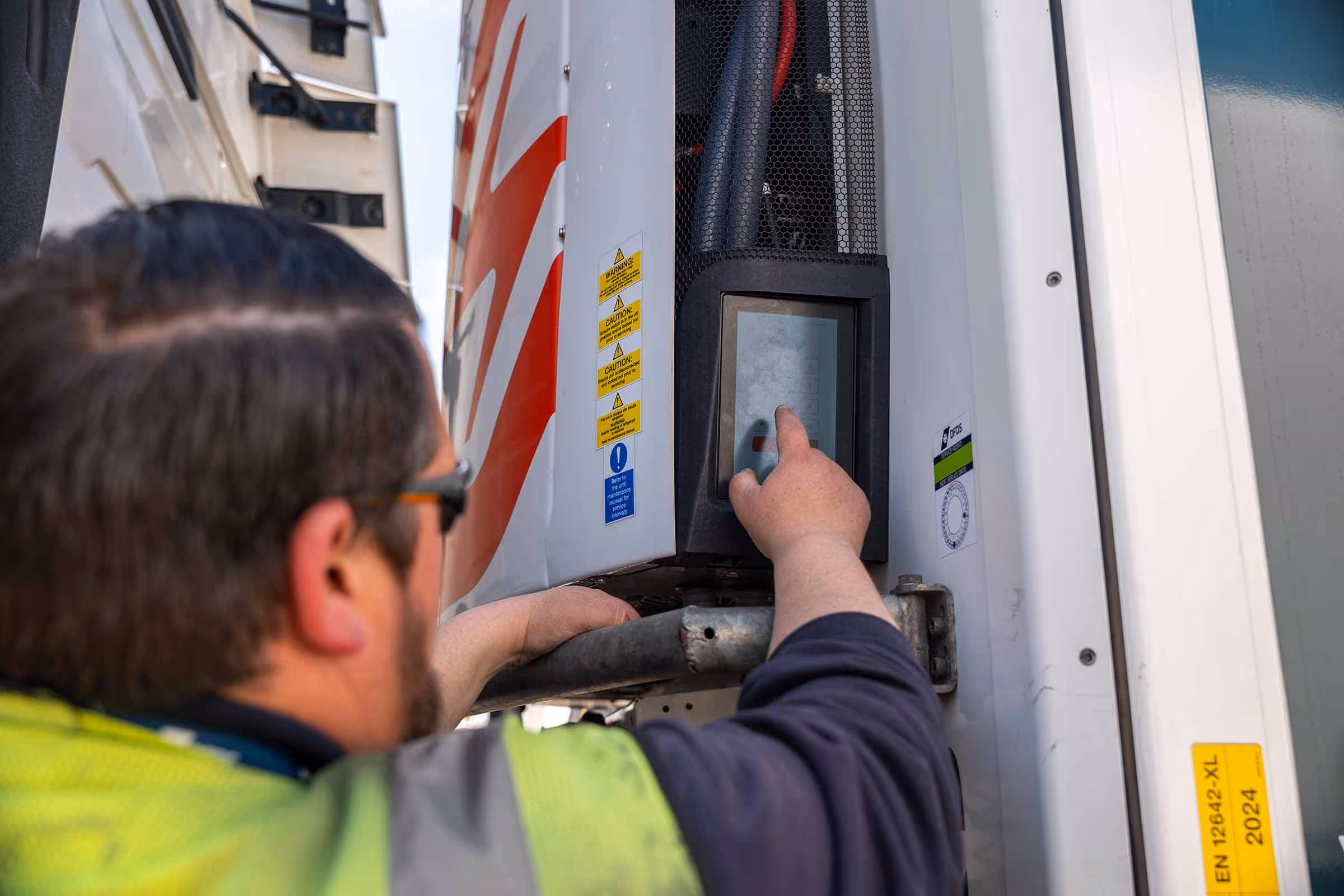 Sunswap technician operating on Susnwap Endurance transport refrigeration unit. 