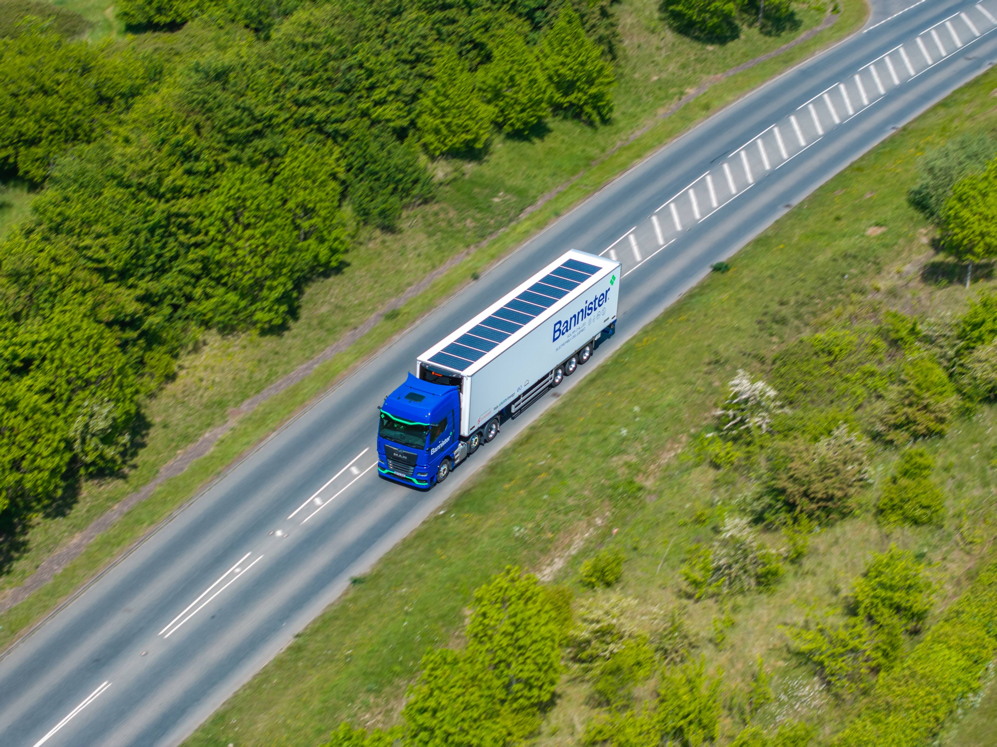 Drone photo shot of Sunswap on Bannister truck and trailer during transportation