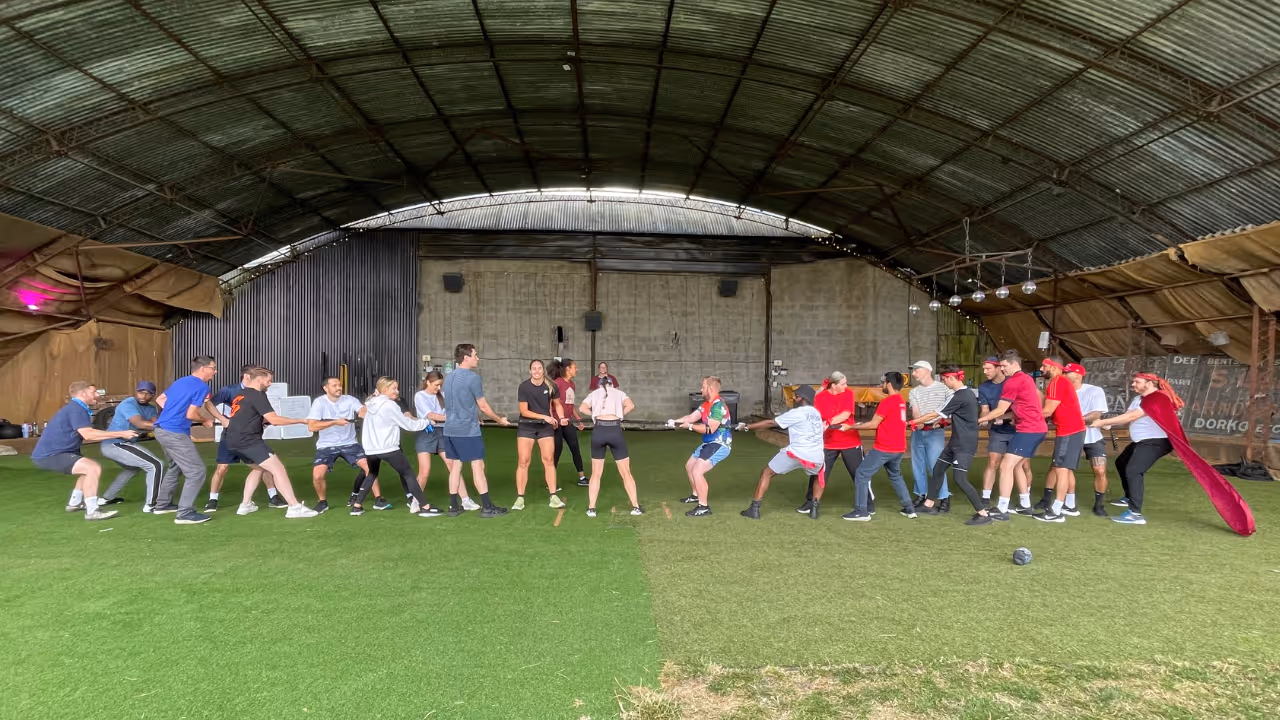 Sunswap on a fun sports day playing tug of war