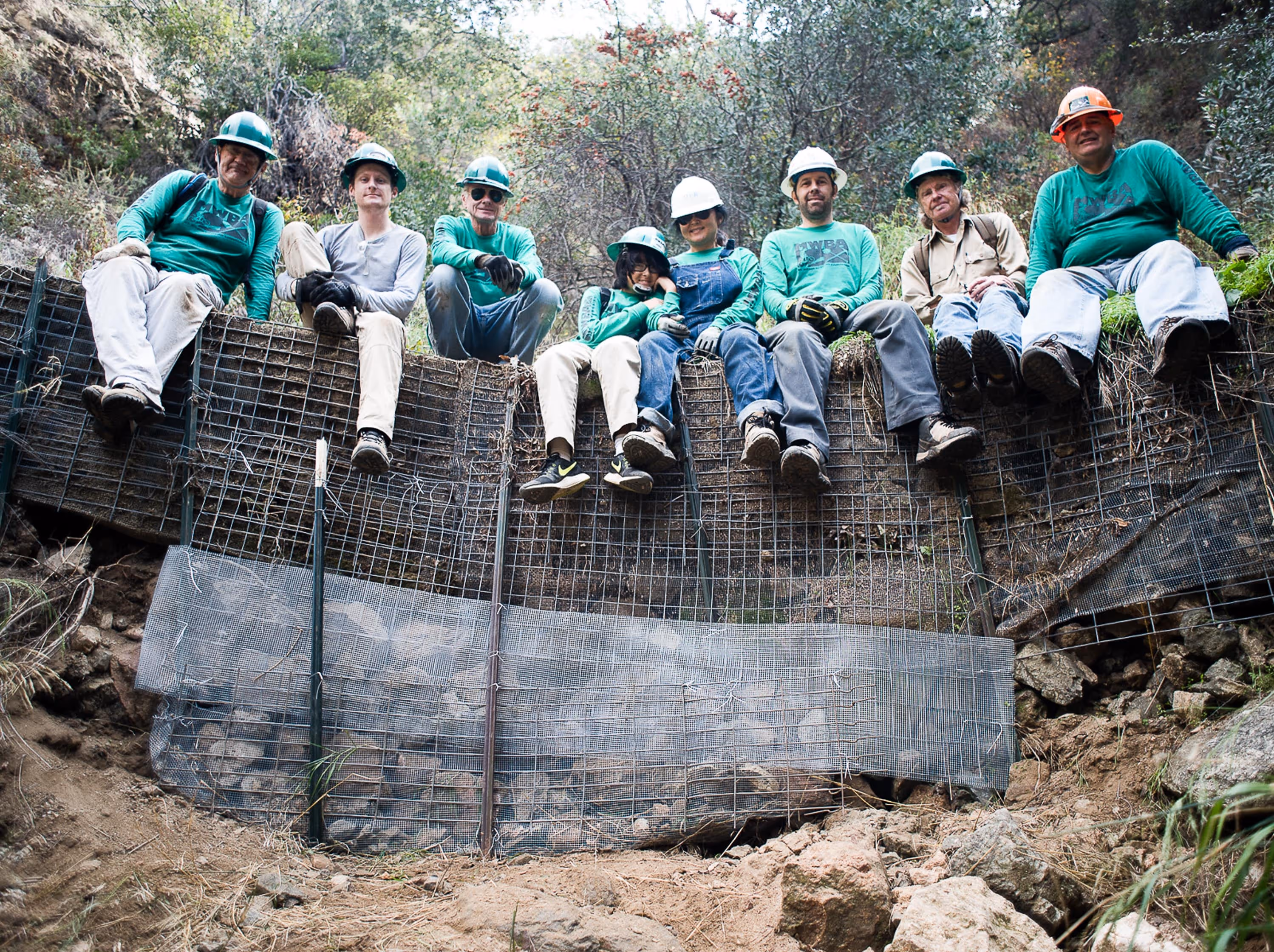 MWBA team members posing on a structural repair project on the Ken Burton trail in 2016