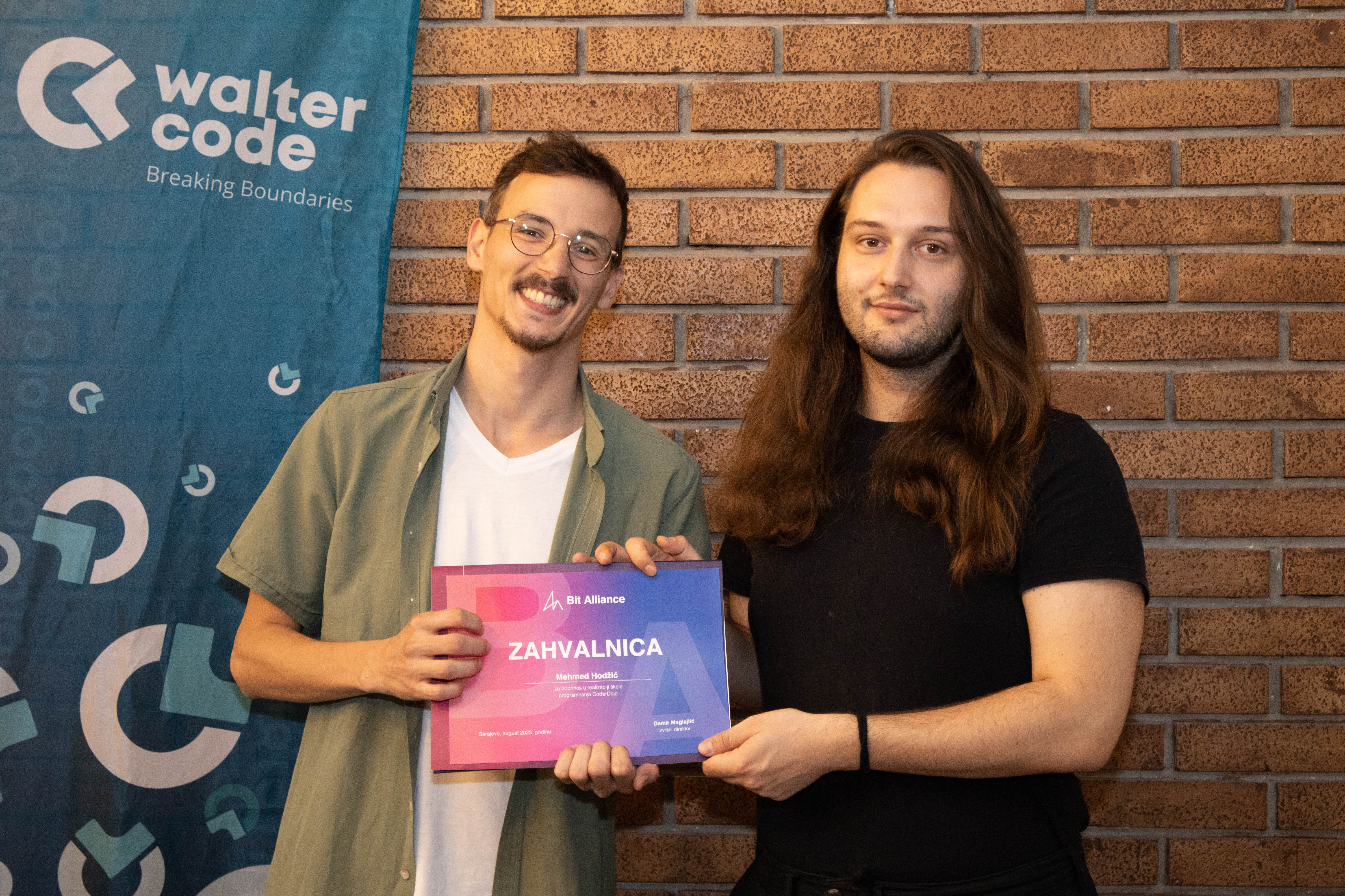 Galeyo team members receiving award at community education event