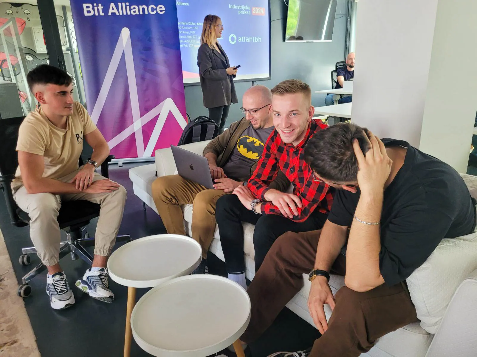 Internship program participants learning and collaborating