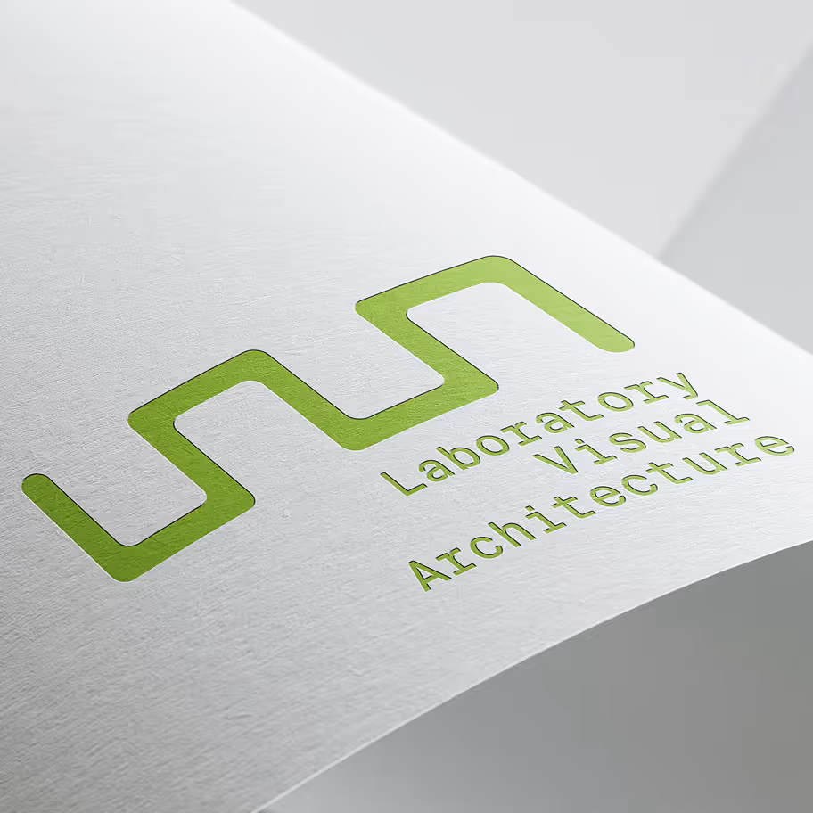 Close-up of the LAVA (Laboratory for Visual Architecture) logo embossed on textured paper. The modular, wave-like mark reflects the studio’s focus on visual systems and experimental architectural logic.