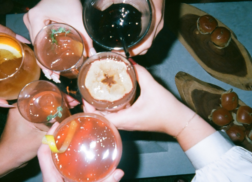 Friends sharing drinks
