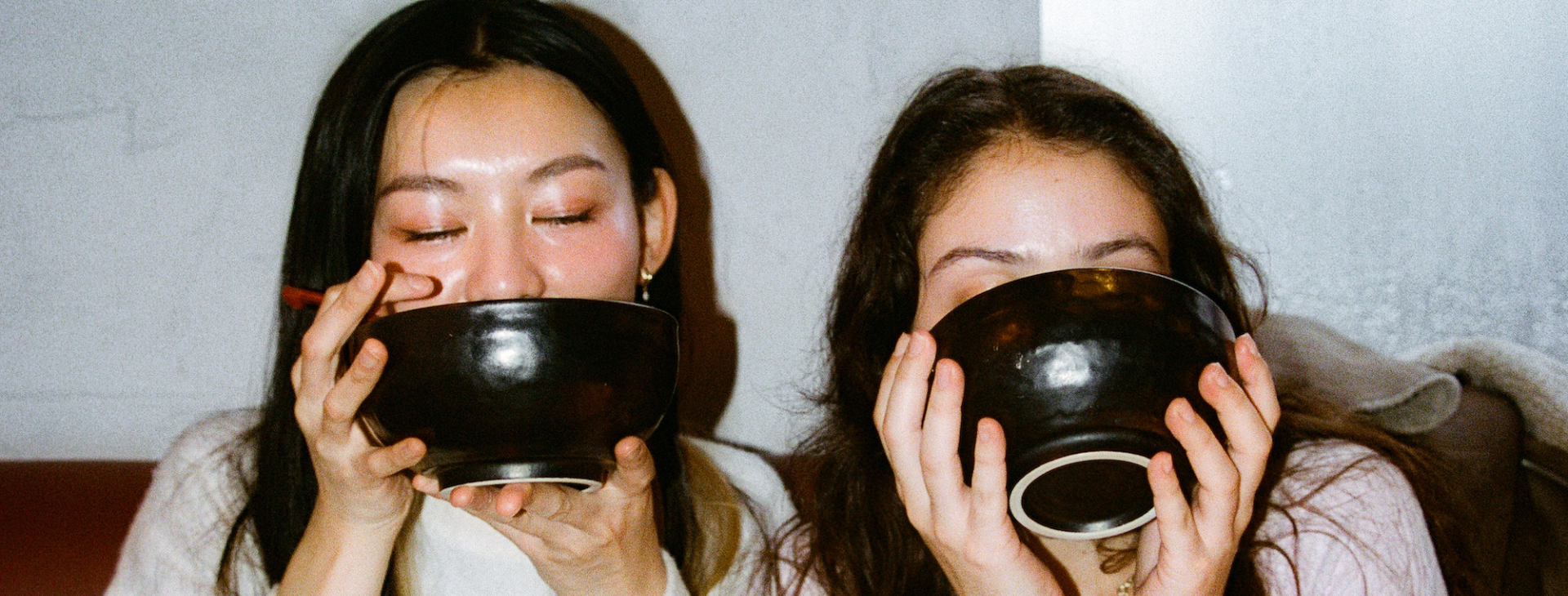 two friends enjoying dinner together