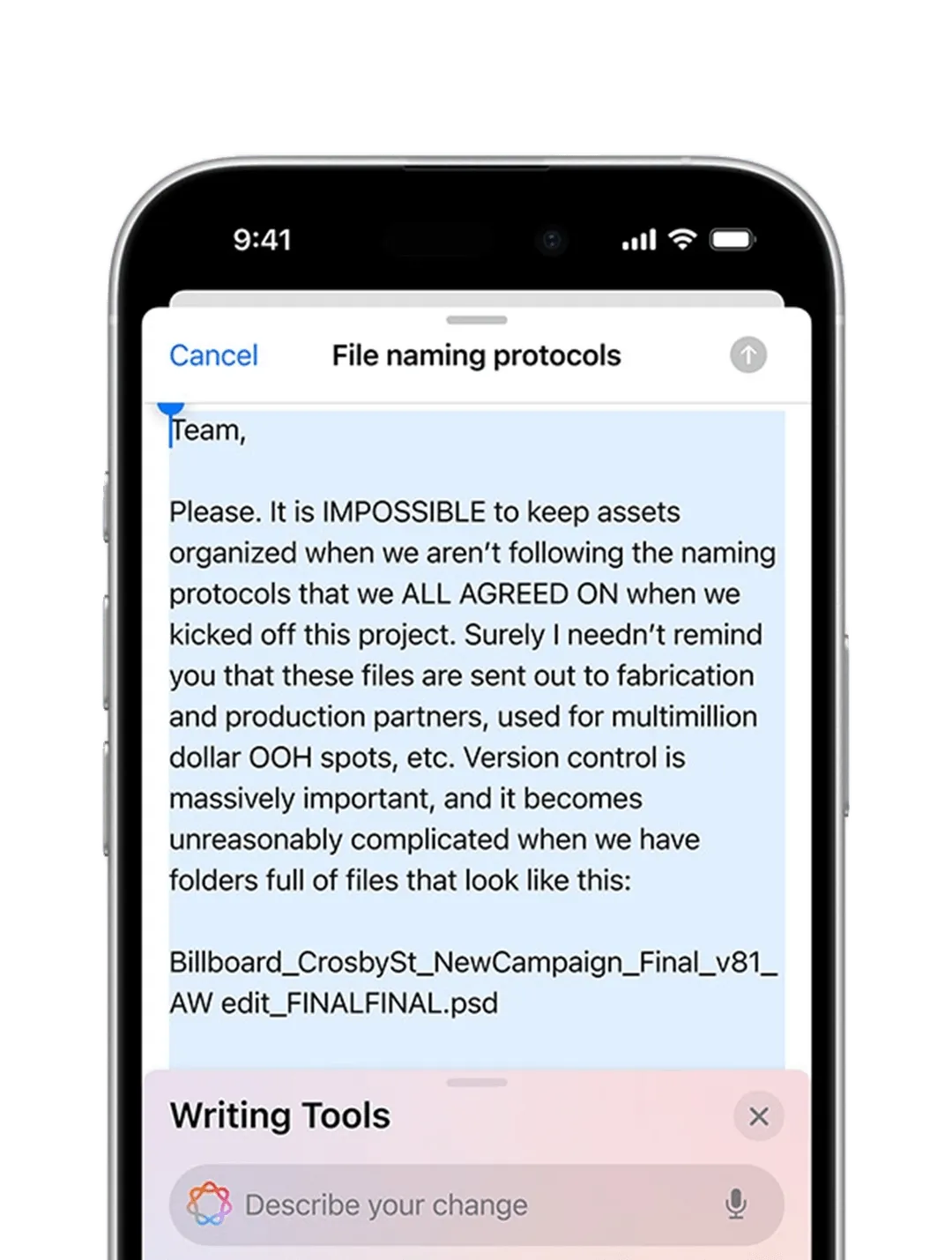 An iPhone showing AI making suggestions to an email.