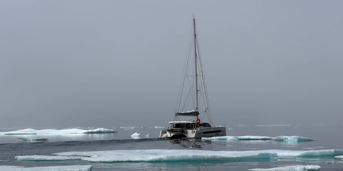 Garcia Explocat 52 catamaran Hafiz sailing through sea ice in Franklin Bay during the Northwest Passage.