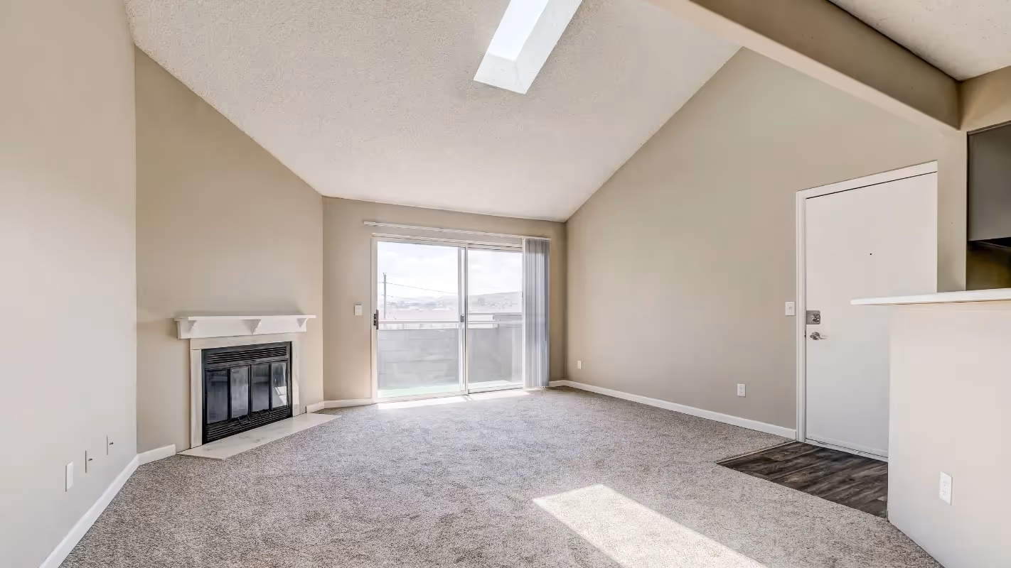 living area with patio and fire place