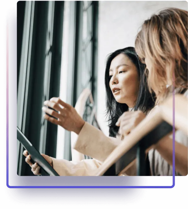 Two people in discussion or meeting talking on background with colorful frame